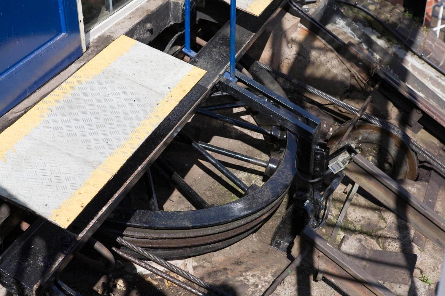 Steel haulage rope running over a track roller